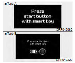 Kia Carens. Appuyer sur le bouton de mise en marche avec la clé intelligente (pour le système de clé intelligente)